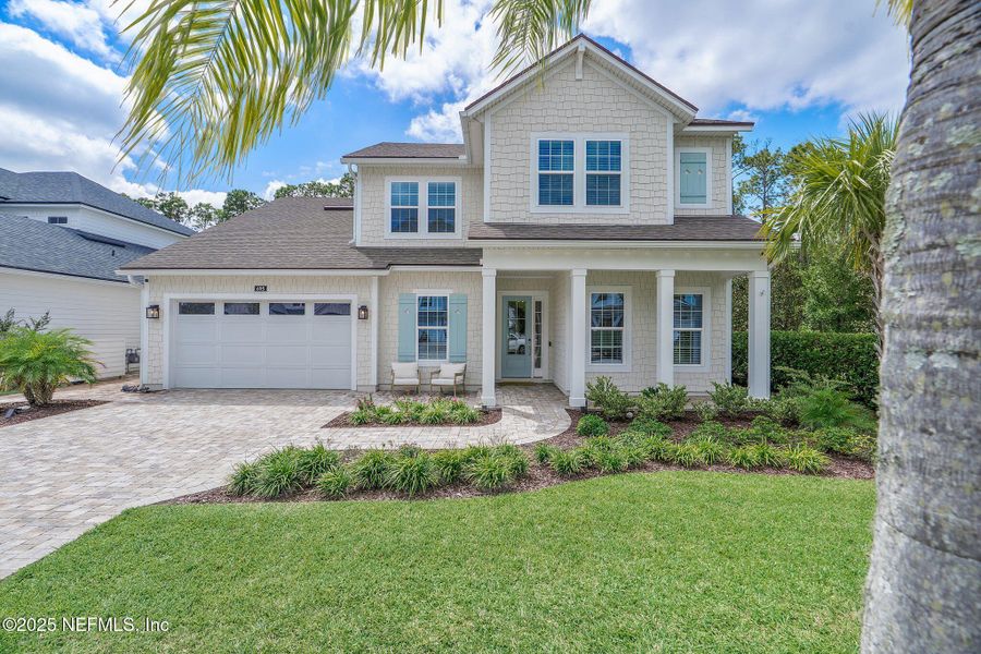 Front exterior of a new home in Palm Crest AT Seabrook, Ponte Vedra, FL, highlighting curb appeal (Image 22).