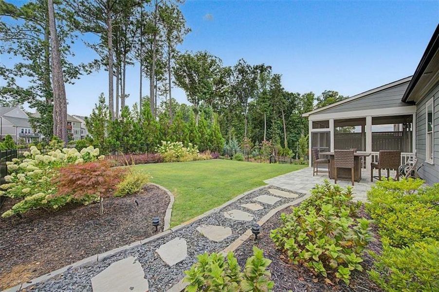Exterior details and patio area of a home in Lakeside at River Green, Canton (Image 3).