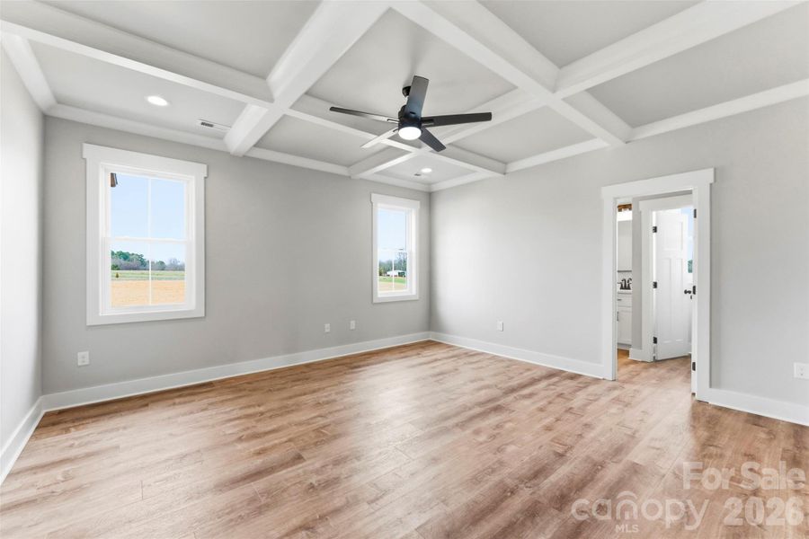 Primary Bedroom - Check out those Coffered Ceilings Primary Bedroom - Check out those Coffered Ceilings
