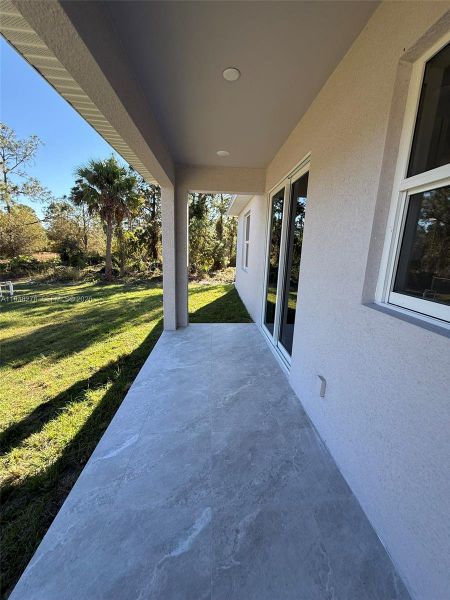 Exterior details and patio area of a home in , Lehigh Acres (Image 3).