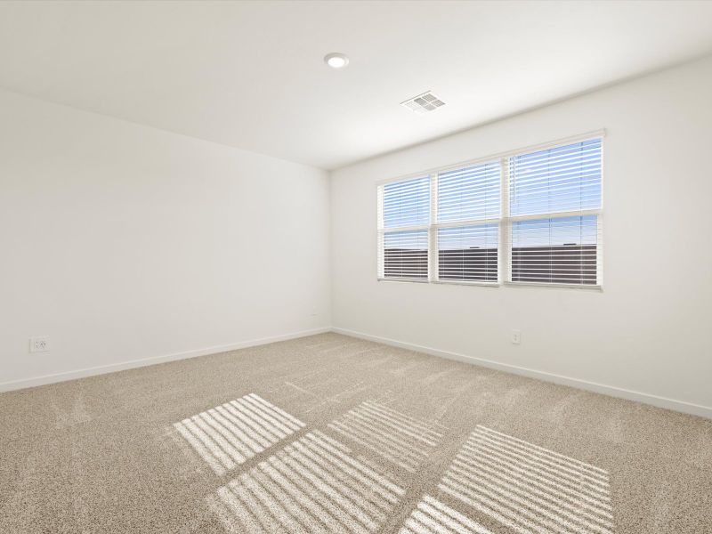 Spacious, unfurnished interior of a new home in Rancho Mirage Signature Series, Maricopa (Image 12).