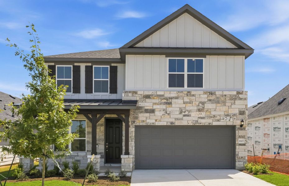 Front exterior of a new home in Kuempel Farms, Pflugerville, TX, highlighting curb appeal (Image 20).