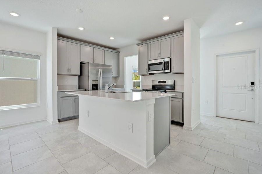 Furnished interior view inside a new home in Wellness Ridge, Clermont (Image 7).