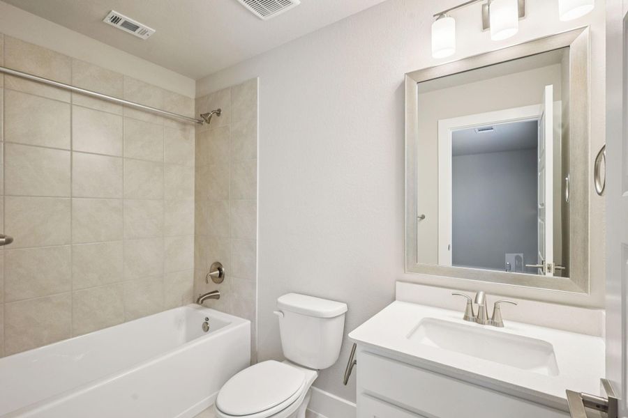 Furnished interior view inside a new home in Montgomery Oaks - Estate, Conroe (Image 6). Furnished interior view inside a new home in Montgomery Oaks - Estate, Conroe (Image 6).