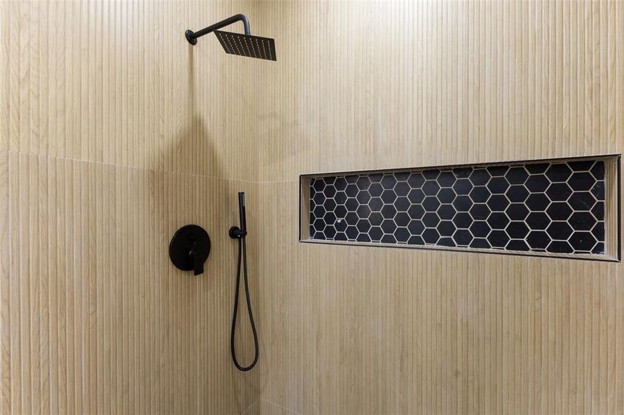 Bathroom view of a tile shower