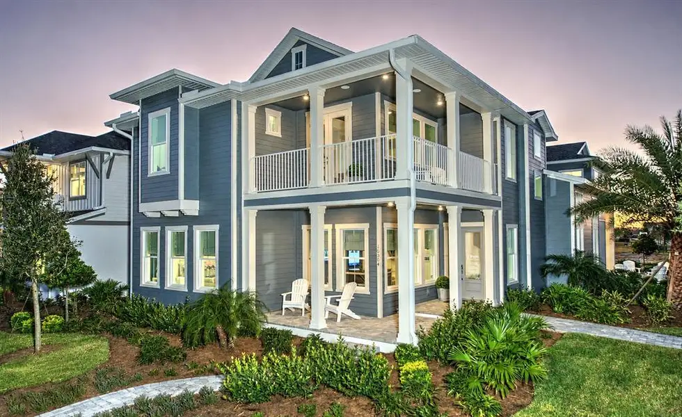 Front exterior of a new home in Laureate Park, Orlando, FL, highlighting curb appeal (Image 2).