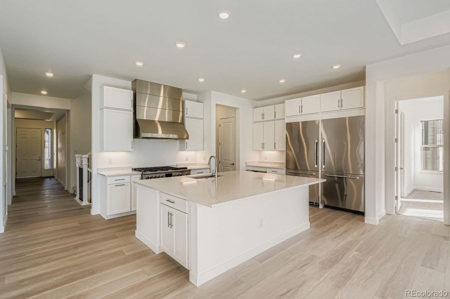Furnished interior view inside a new home in Red Rocks Ranch: The Grand Collection, Morrison (Image 5).