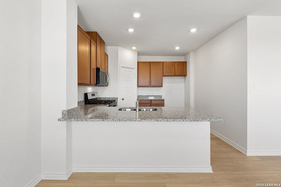 Furnished interior view inside a new home in Punta Verde, Converse (Image 13).