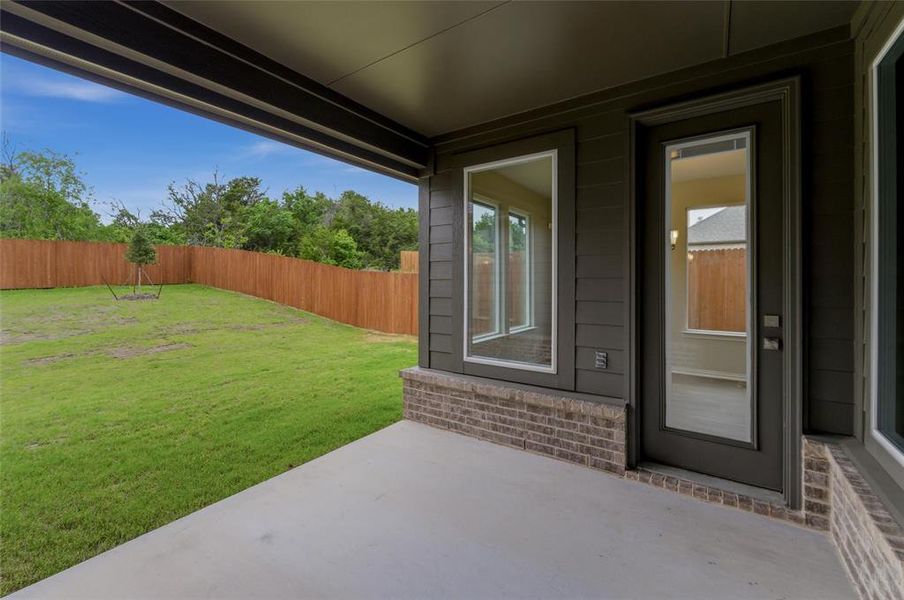 Exterior details and patio area of a home in Waterford Park, Weatherford (Image 3).