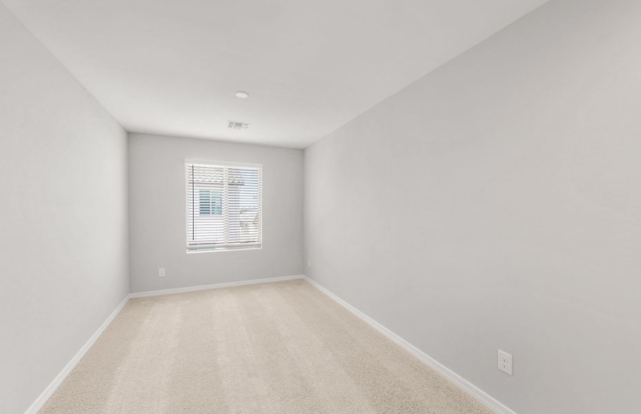 Spacious, unfurnished interior of a new home in Asante- Atrium Series, Surprise (Image 23).