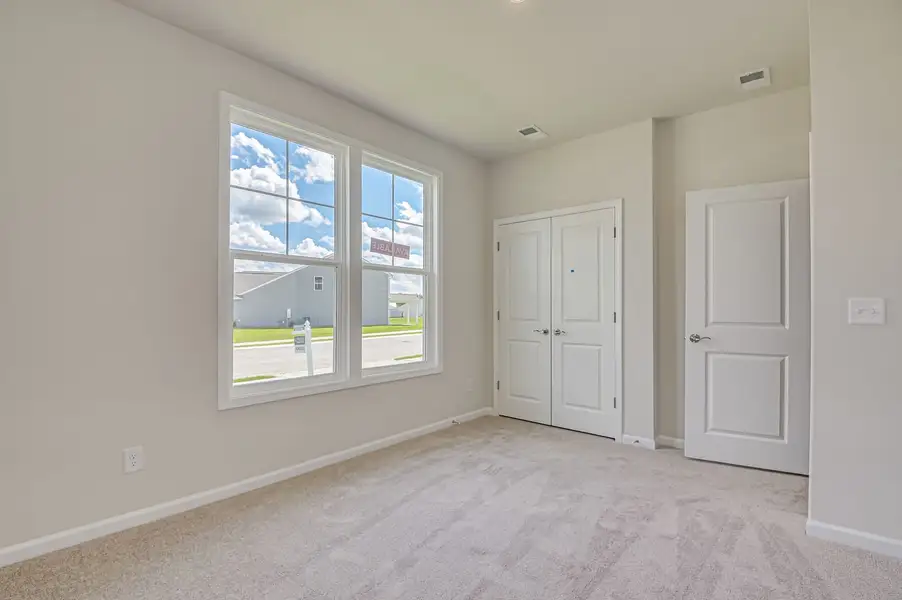 Spacious, unfurnished interior of a new home in The Beacon at Old Peachtree Single Family Homes, Lawrenceville (Image 27).