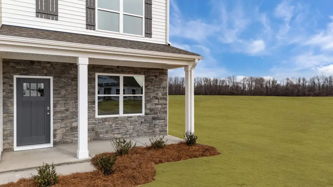 Exterior details and patio area of a home in Ridgewood Farms, Winterville (Image 3). Exterior details and patio area of a home in Ridgewood Farms, Winterville (Image 3).