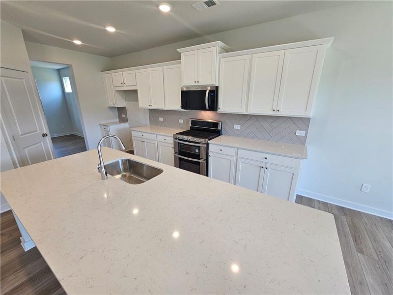 Furnished interior view inside a new home in Ellorie Estates, Dawsonville (Image 5). Furnished interior view inside a new home in Ellorie Estates, Dawsonville (Image 5).