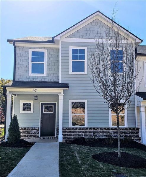 Front exterior of a new home in , Conyers, GA, highlighting curb appeal (Image 15).
