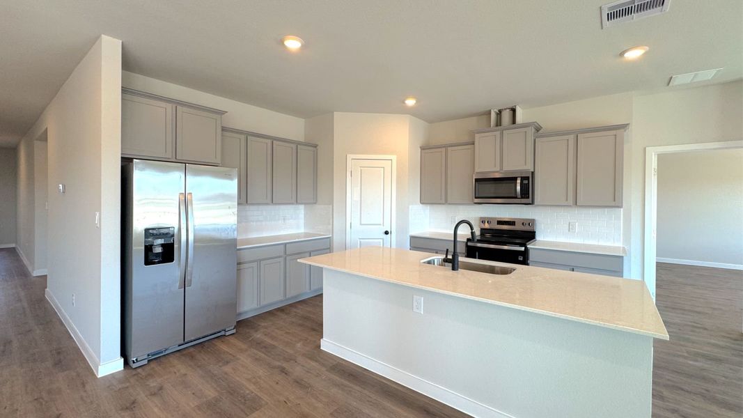 Furnished interior view inside a new home in King's Landing, Corpus Christi (Image 5).