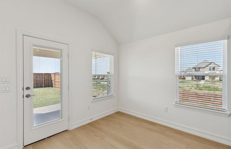 Breakfast nook off kitchen with large windows Breakfast nook off kitchen with large windows