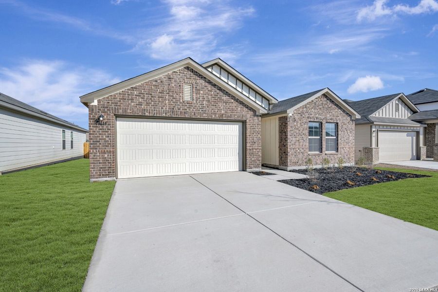 Front exterior of a new home in Winding Brook, San Antonio, TX, highlighting curb appeal (Image 26).