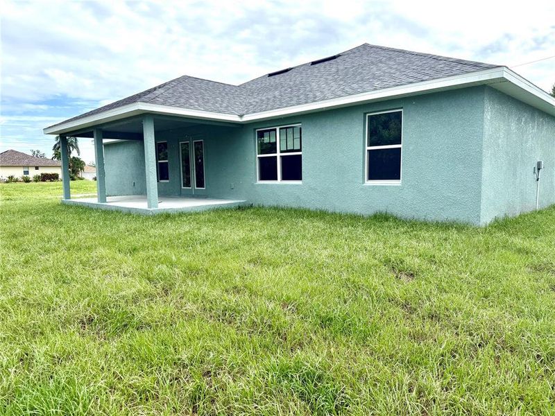 Front exterior of a new home in Rotonda, Rotonda West, FL, highlighting curb appeal (Image 13).