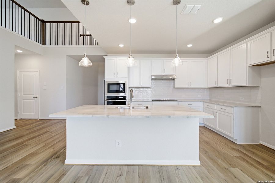 Furnished interior view inside a new home in The Woodlands at Medina Hills, Mico (Image 8).