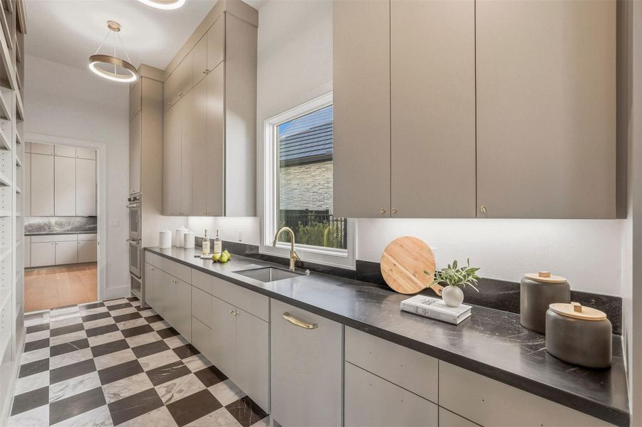 Welcome to your catering kitchen/service kitchen/chef's pantry; thoughtful with intentional design, privacy and efficiency in mind. Double ovens here (and another oven in the main kitchen), dishwasher, sink and full-sized fridge in this professional-grade prep kitchen. Welcome to your catering kitchen/service kitchen/chef's pantry; thoughtful with intentional design, privacy and efficiency in mind. Double ovens here (and another oven in the main kitchen), dishwasher, sink and full-sized fridge in this professional-grade prep kitchen.