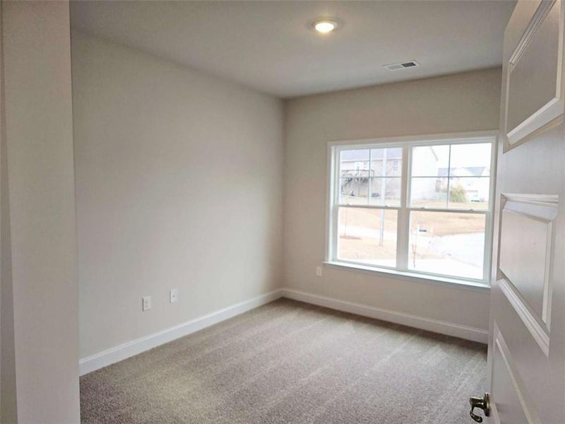 Spacious, unfurnished interior of a new home in Scarlett Place, Bowdon (Image 5).