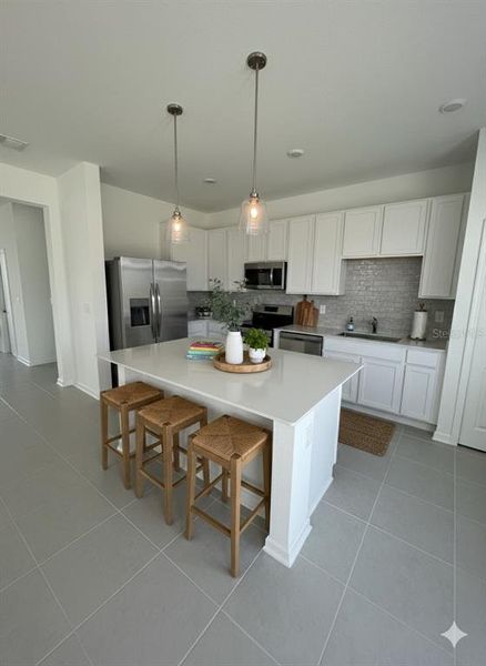 Furnished interior view inside a new home in , Kissimmee (Image 3). Furnished interior view inside a new home in , Kissimmee (Image 3).