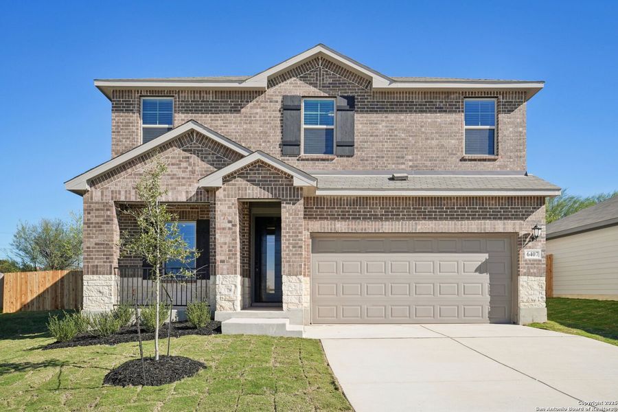 Front exterior of a new home in Royal Crest, San Antonio, TX, highlighting curb appeal (Image 22).
