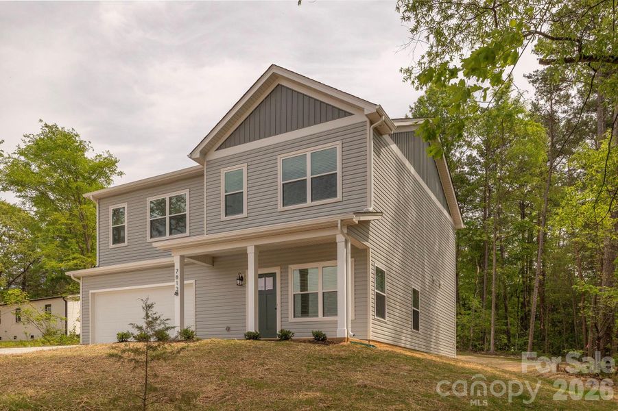 Front exterior of a new home in , Charlotte, NC, highlighting curb appeal (Image 25).