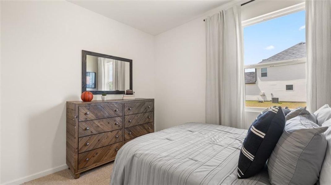 Furnished interior view inside a new home in The Preserve at Agricultural Village, Perry (Image 42).