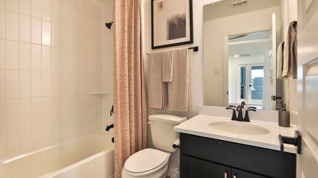 Furnished interior view inside a new home in Bridgeland Creekland Village, Cypress (Image 4).