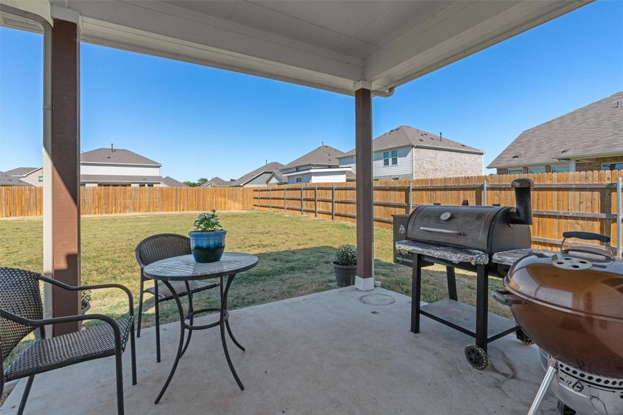Enjoy a barbecue on the covered back porch.