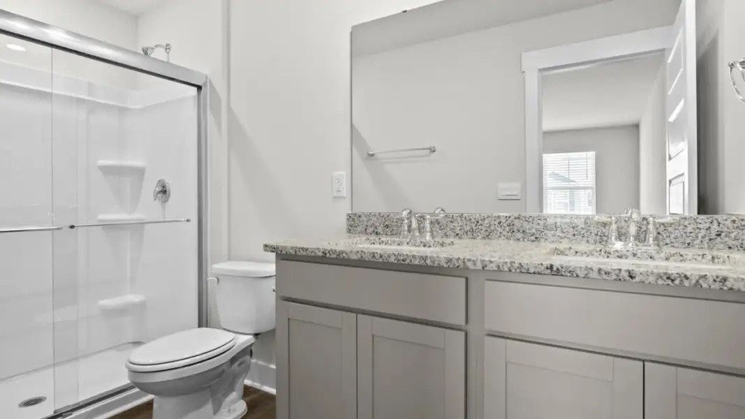 Furnished interior view inside a new home in The Townes at Cedar Hill Landing, Navassa (Image 9).