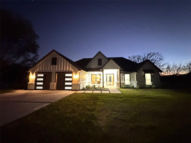 Front exterior of a new home in , Poetry, TX, highlighting curb appeal (Image 23). Front exterior of a new home in , Poetry, TX, highlighting curb appeal (Image 23).
