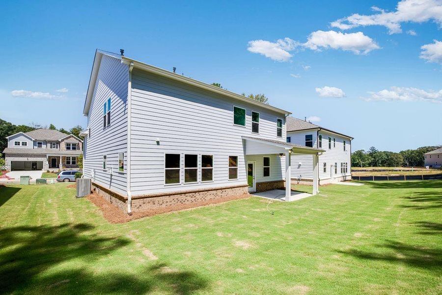 Front exterior of a new home in Bailey Fence, Dacula, GA, highlighting curb appeal (Image 22).