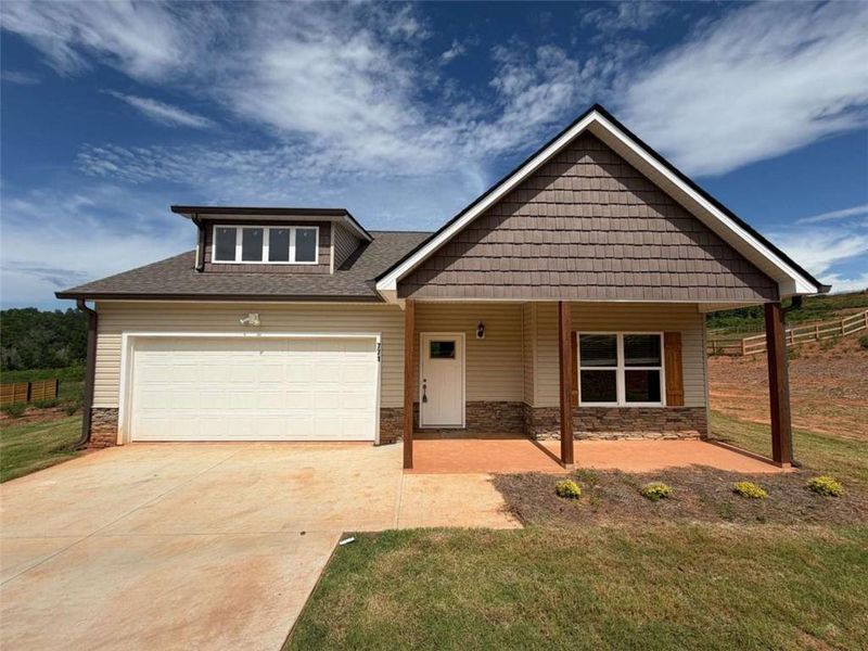 Front exterior of a new home in , Eastanollee, GA, highlighting curb appeal (Image 2). Front exterior of a new home in , Eastanollee, GA, highlighting curb appeal (Image 2).