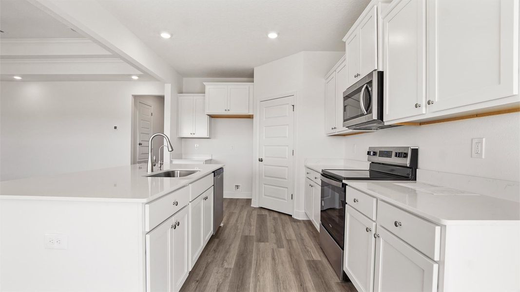Representative furnished interior of a home built from the Madison by D.R. Horton in Owl's Head Farms, Freeport (Image 10).