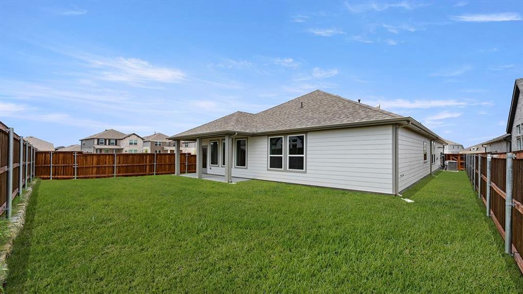 Exterior details and patio area of a home in Waterscape, Royse City (Image 19). Exterior details and patio area of a home in Waterscape, Royse City (Image 19).