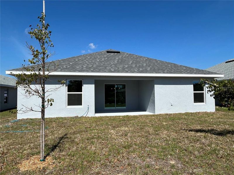 Exterior details and patio area of a home in Watercress Cove, North Port (Image 15).