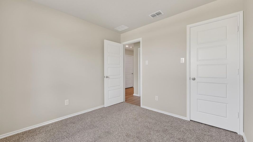 Spacious, unfurnished interior of a new home in Monarch at the Meadows, Ponder (Image 25).