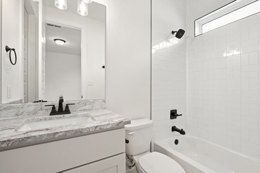 Furnished interior view inside a new home in Lagos Reserve, Manor (Image 15).