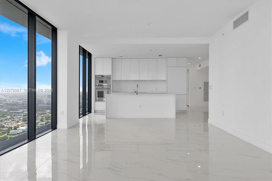 Spacious, unfurnished interior of a new home in Aria Reserve, Miami (Image 9). Spacious, unfurnished interior of a new home in Aria Reserve, Miami (Image 9).