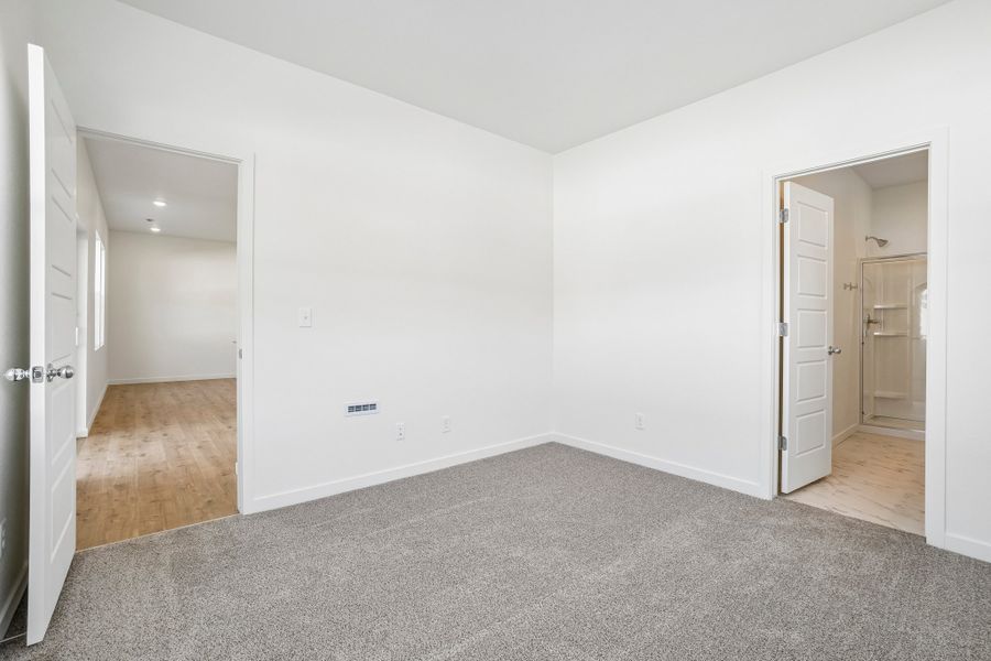 Spacious, unfurnished interior of a new home in Union Colony West, Greeley (Image 21).