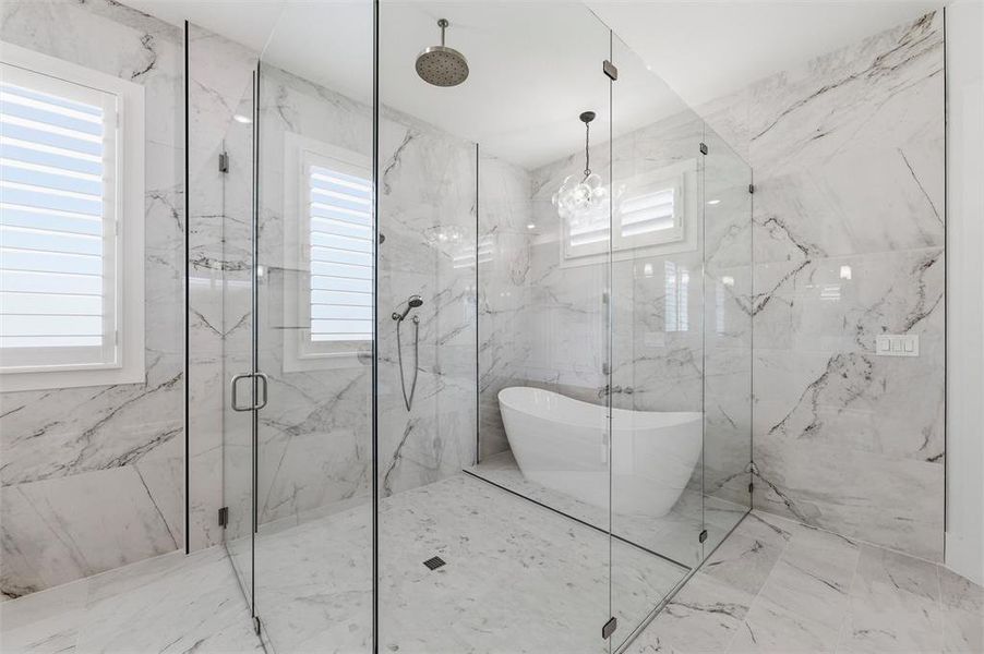 Wet room shower and tub with rain head and wall shower