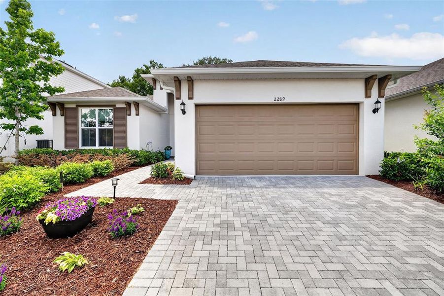 Front exterior of a new home in , Mount Dora, FL, highlighting curb appeal (Image 24).