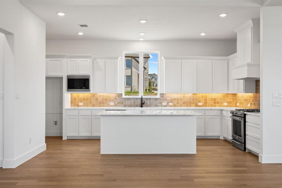 Furnished interior view inside a new home in The Heights at Uptown Celina, Celina (Image 9).