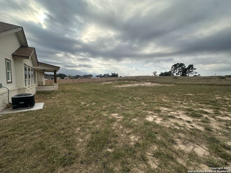Exterior details and patio area of a home in , Floresville (Image 1).