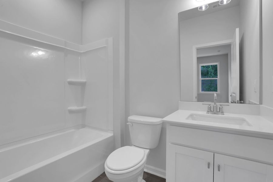 Furnished interior view inside a new home in Towne Village at Suwanee Dam, Sugar Hill (Image 8).