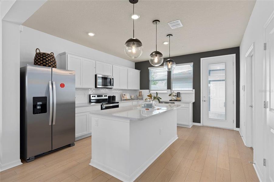 Furnished interior view inside a new home in Parkside Trails, Clermont (Image 13).