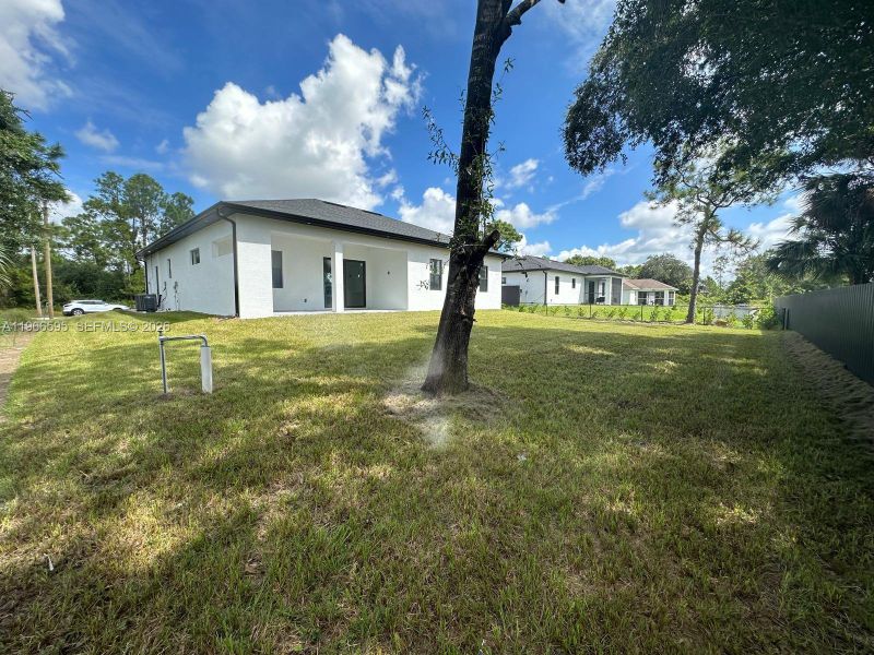 Exterior details and patio area of a home in , Lehigh Acres (Image 20).