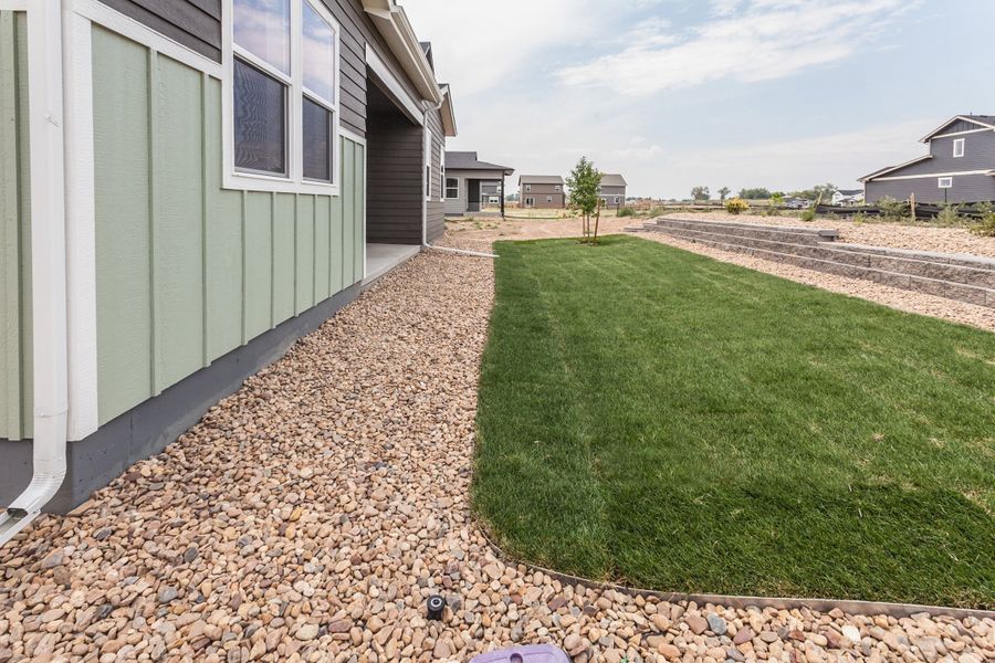 Exterior details and patio area of a home in Prairie Song, Windsor (Image 31). Exterior details and patio area of a home in Prairie Song, Windsor (Image 31).